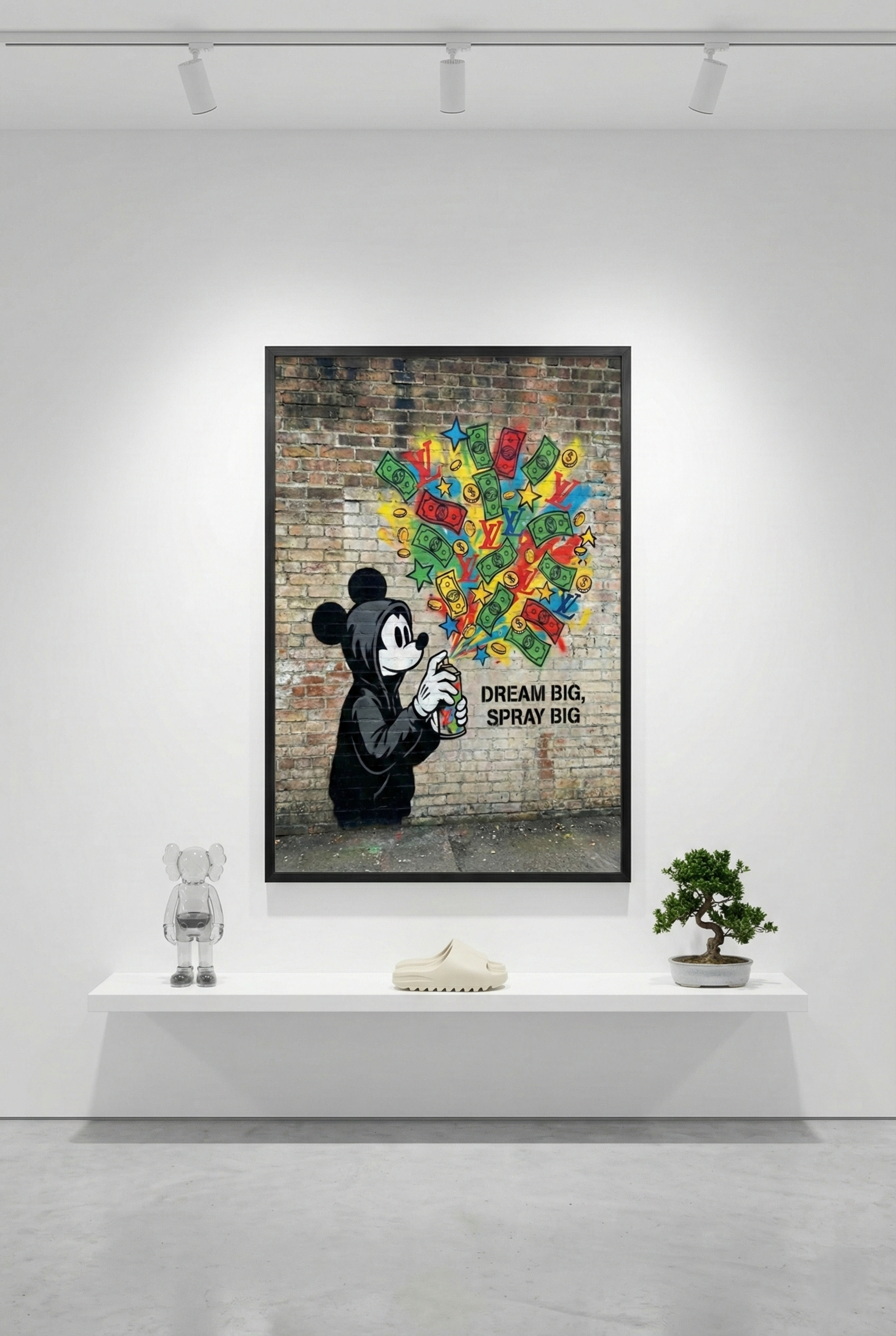 The 'Mickey's Mouse-ka-Tool' framed art piece is the sole focus on a large white wall in a minimalist gallery, with a single floating shelf below it.