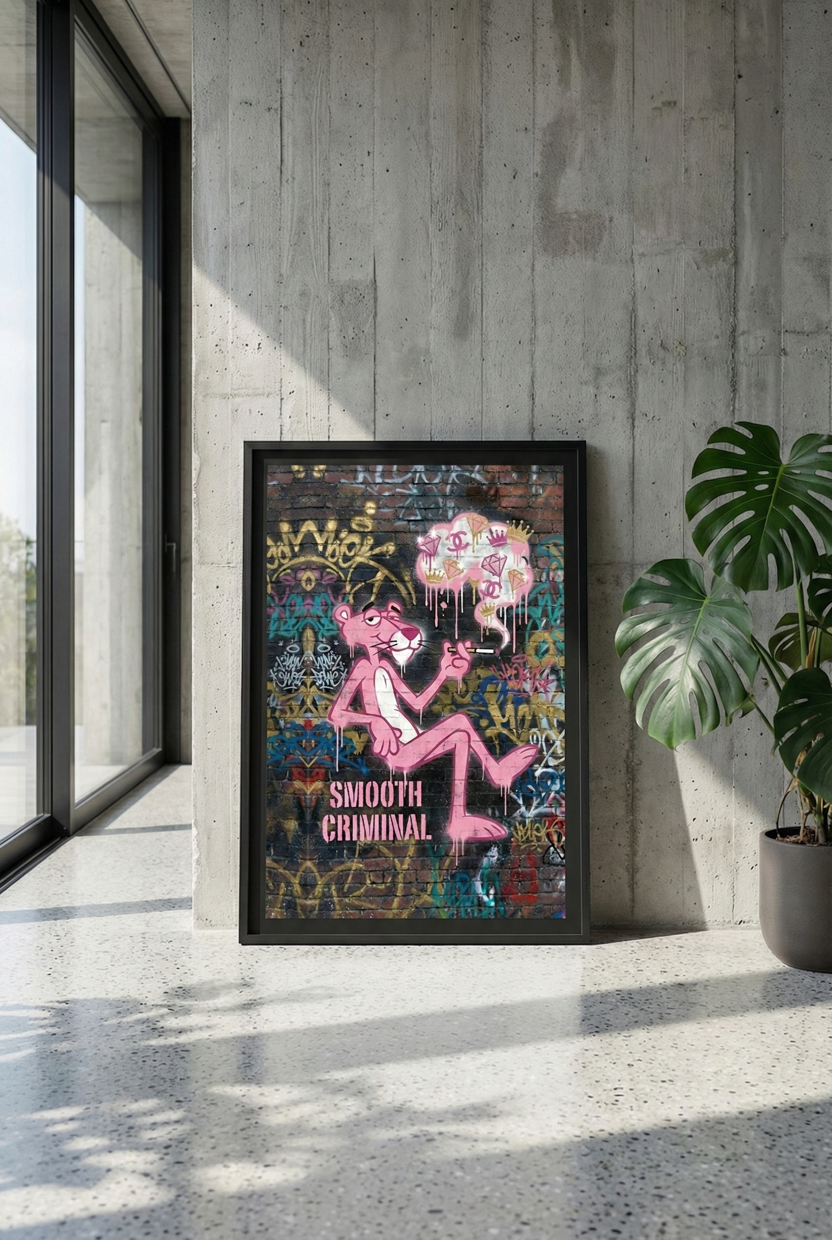 Large premium black framed art of Pink Panther "Smooth Criminal" graffiti by Brzk, leaning against a raw concrete wall in a minimalist luxury apartment with a large Monstera plant next to a modern window.